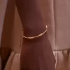 Edición brazalete Eroz bañado en oro de 24 quilates